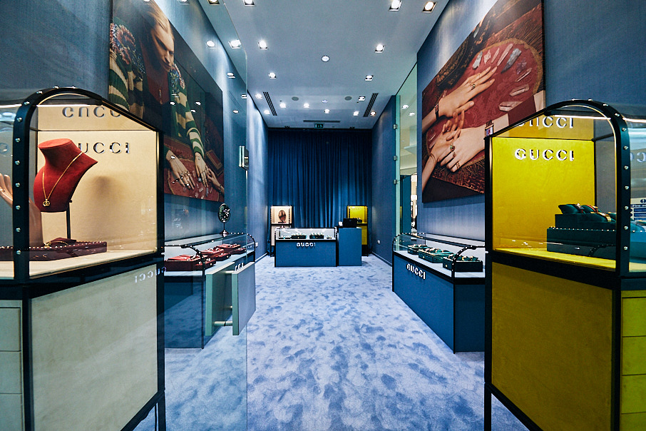 Gucci store interior showcasing watches